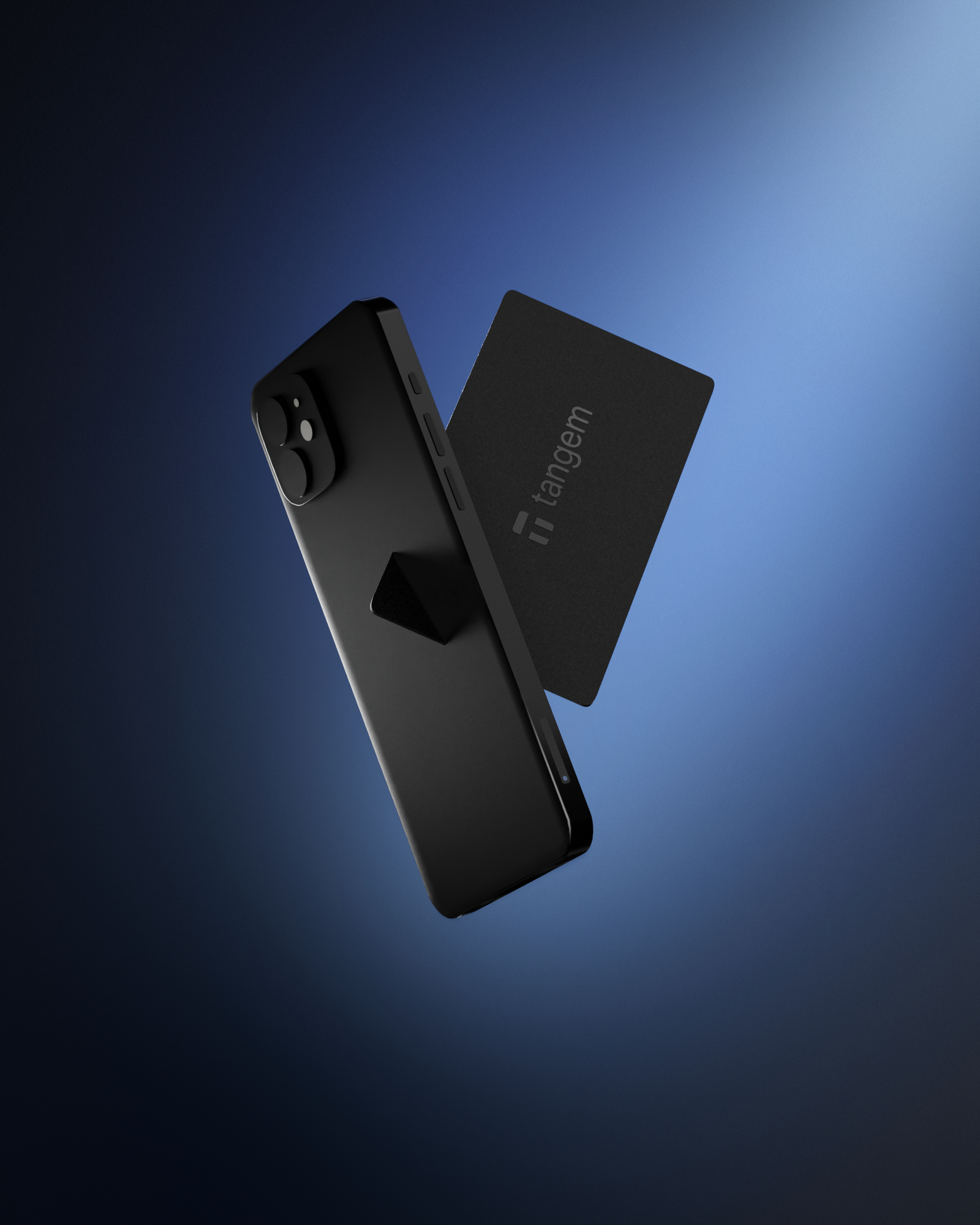 Two Tangem NFC hardware wallet cards on a dark background